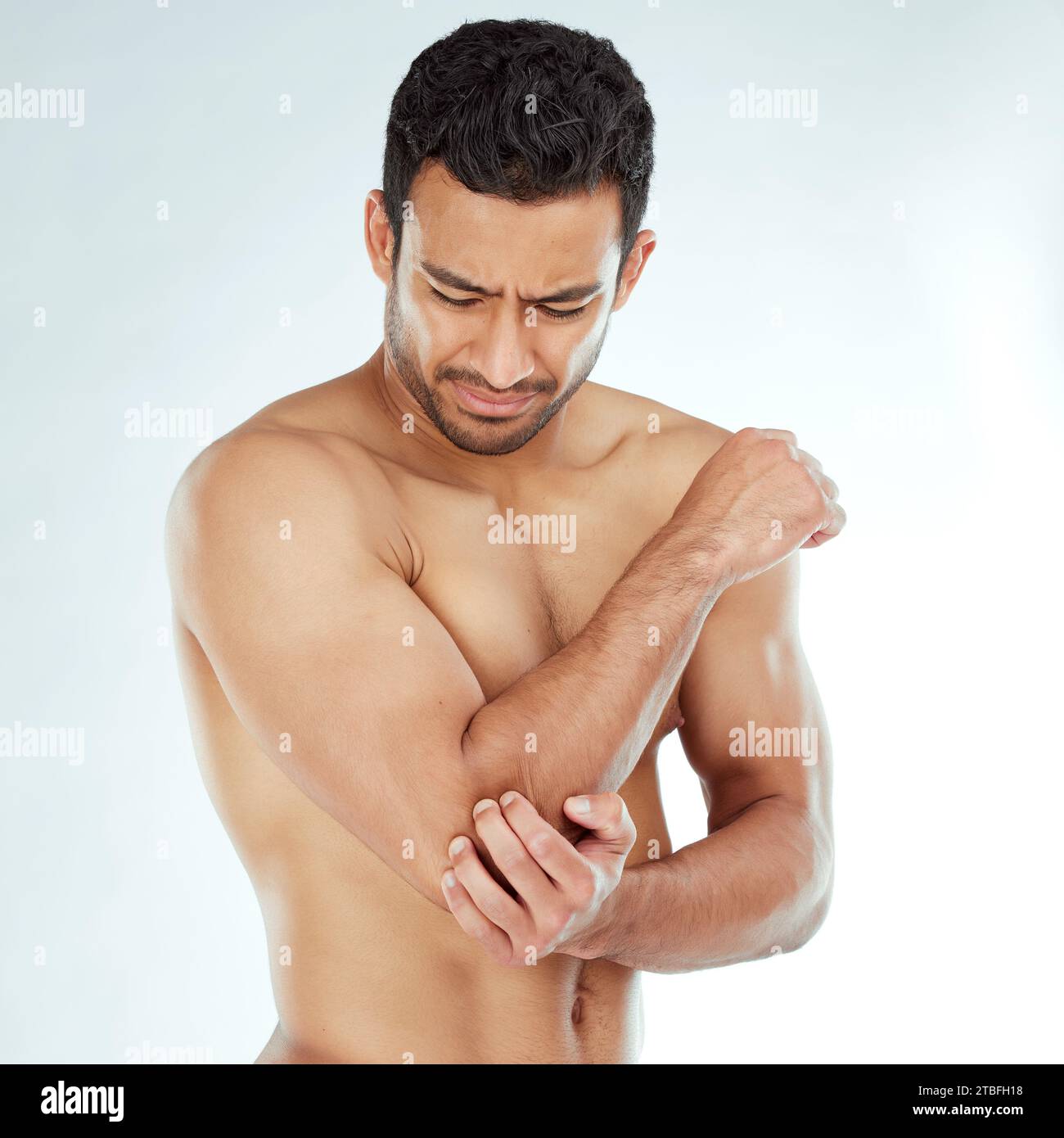 Arm pain, stress and asian fitness man in studio with muscle tension