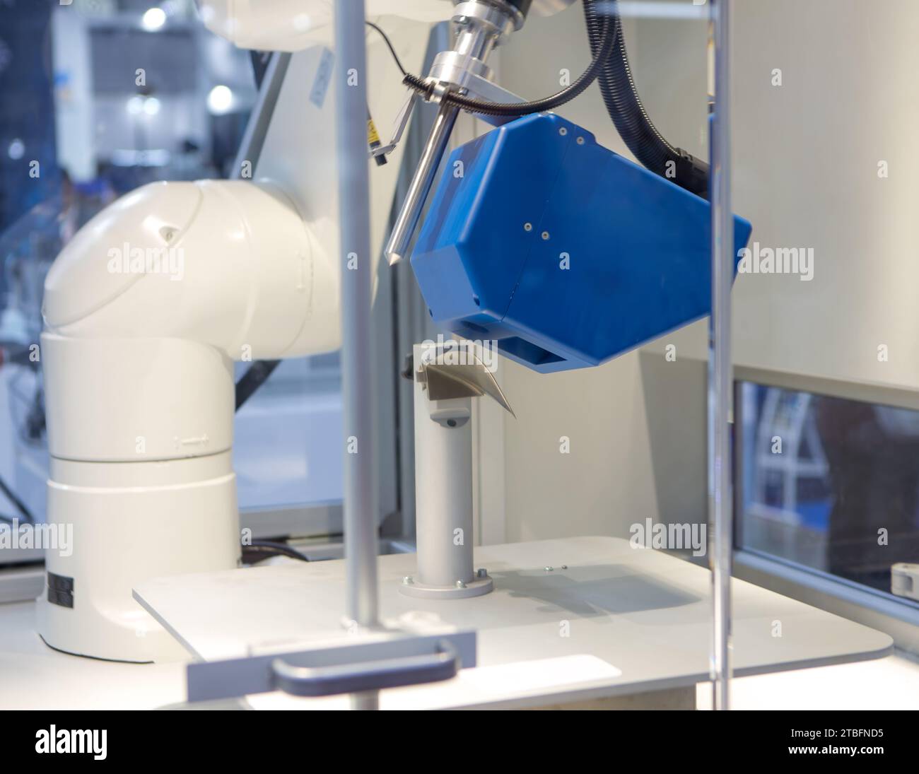 Optical measuring scanner inspecting automotive part. Industrial