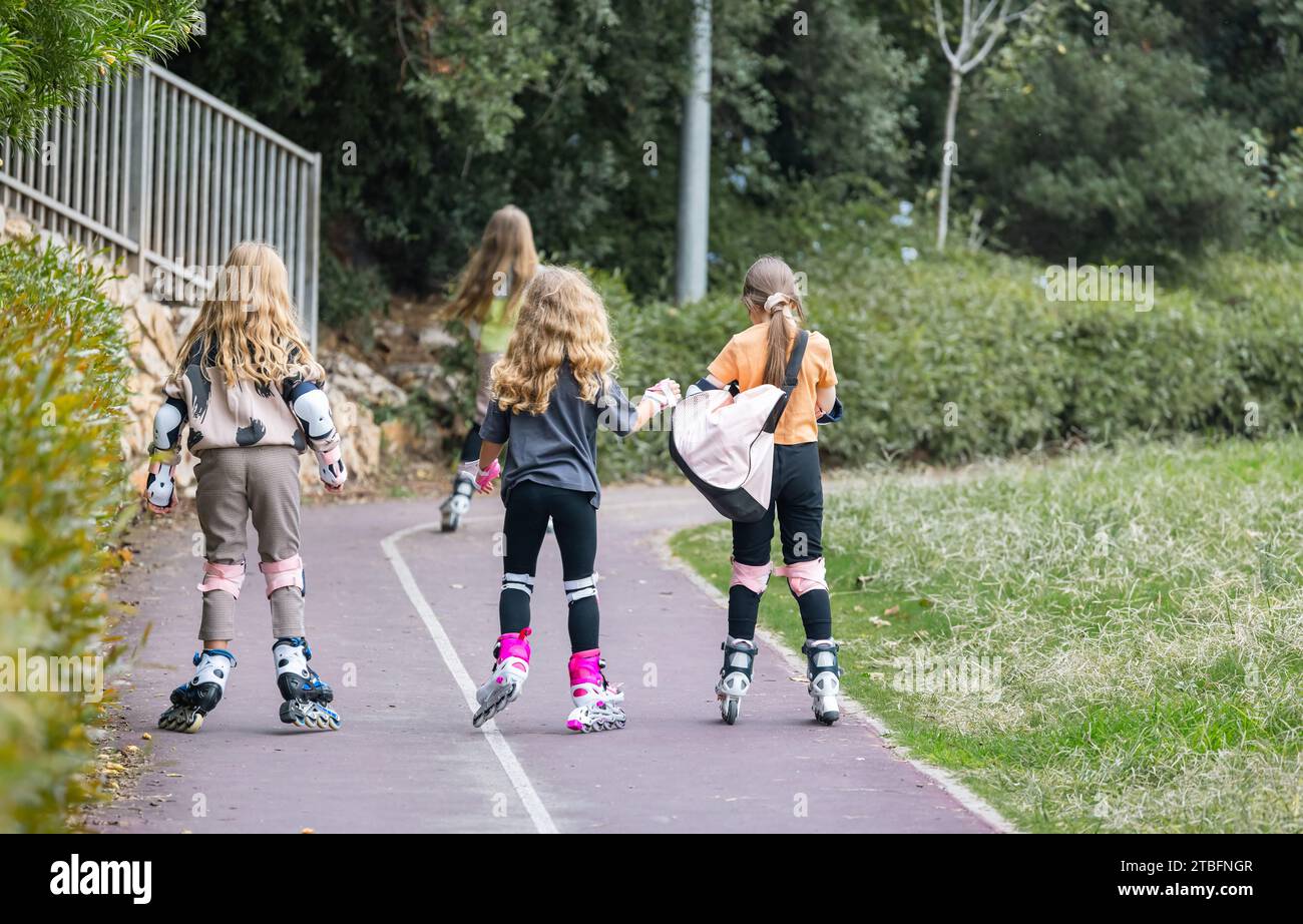 little girls roller skating on a treadmill Stock Photo Alamy