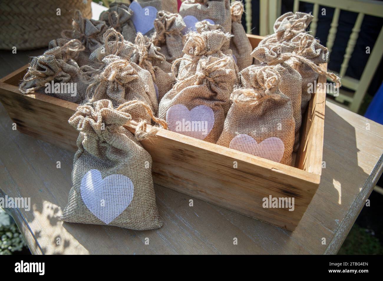 Sachets of rice ready to throw away after a wedding ceremony. Wooden