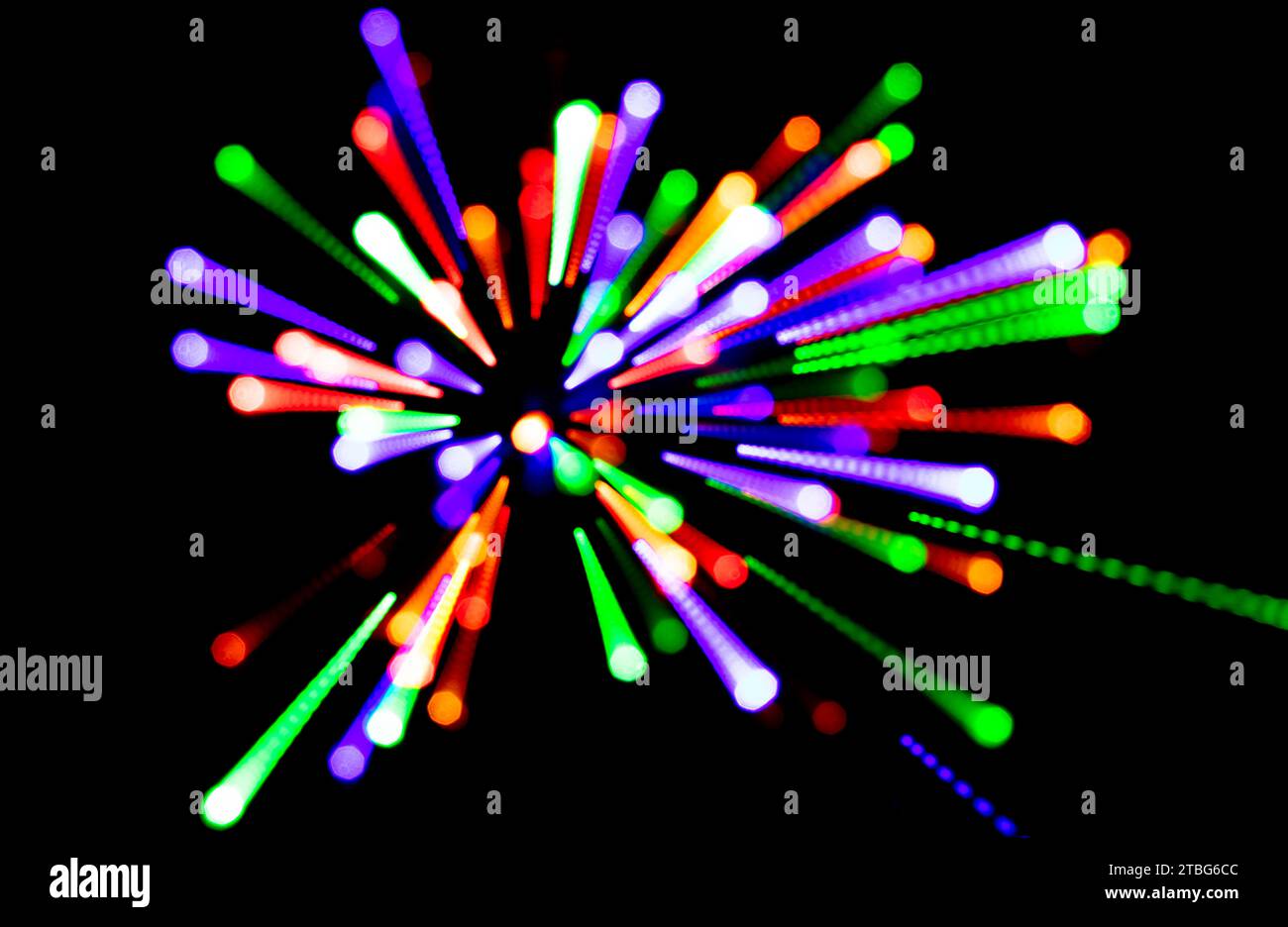 A black background with colorful abstract lights Stock Photo