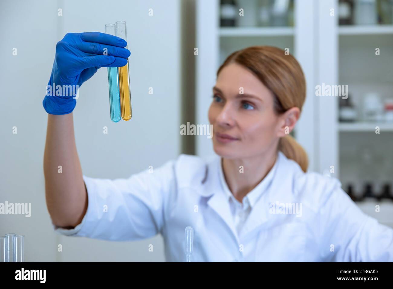 Laboratory research and development. Blonde female lab assistant