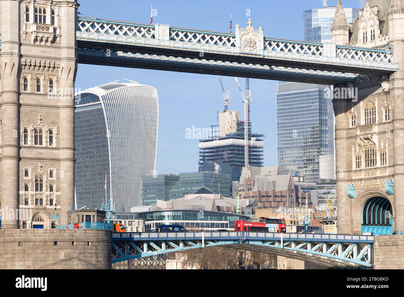 Construction of the skyscraper, 1 Leadenhall Street, is seen through the span of Tower Bridge, London, UK Stock Photo