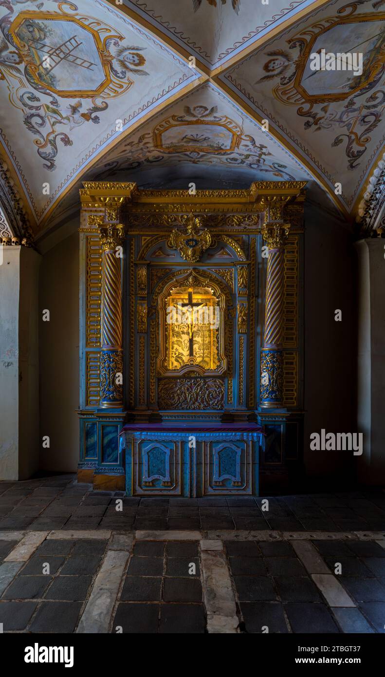 Chapel furniture luxuriously decorated with motifs carved in gold