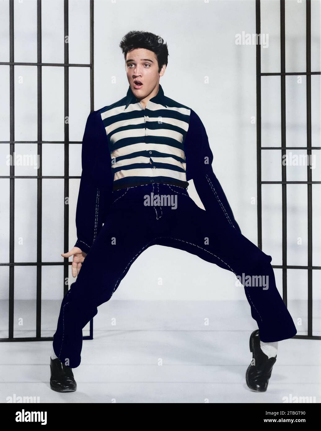King Rock and Roll - Elvis Presley on the film set of Jailhouse Rock, 1957 - colorized version. Stock Photo
