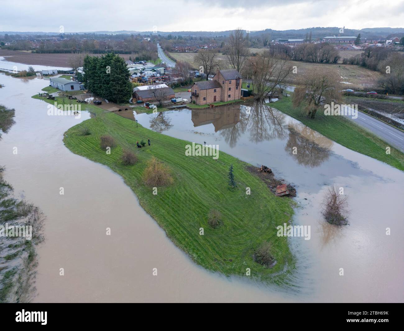 The River Anker bursts it's banks flooding fields alongside the Sheepy Road on the Warwickshire, Leicestershire border. Stock Photo