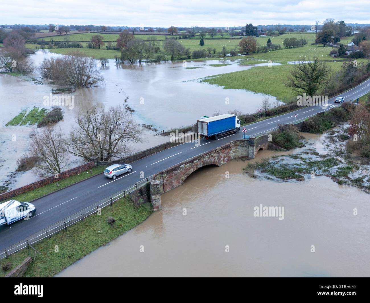 The River Anker bursts it's banks flooding fields alongside the Sheepy Road on the Warwickshire, Leicestershire border. Stock Photo