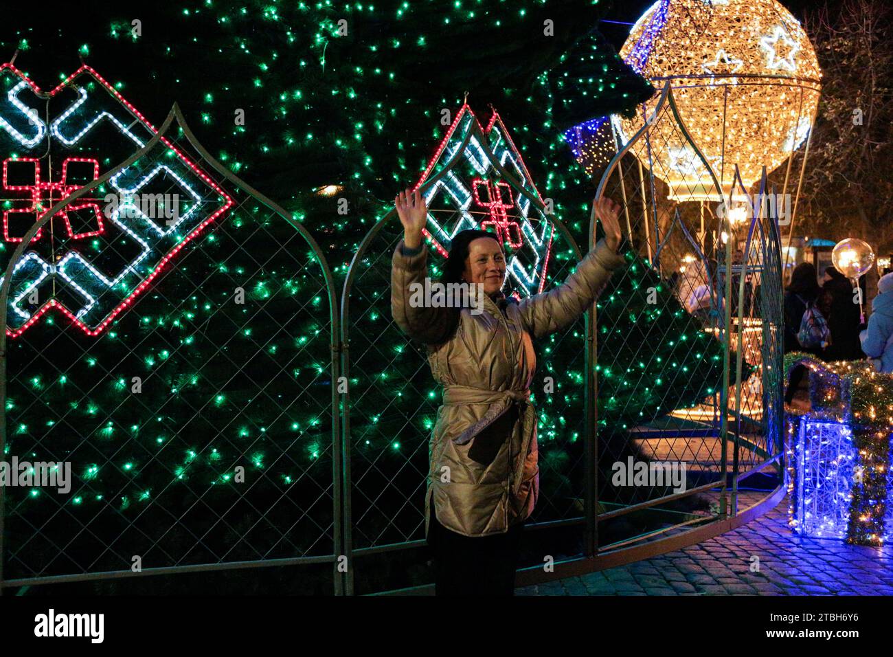 Odessa, Ukraine. 06th Dec, 2023. People take pictures against the