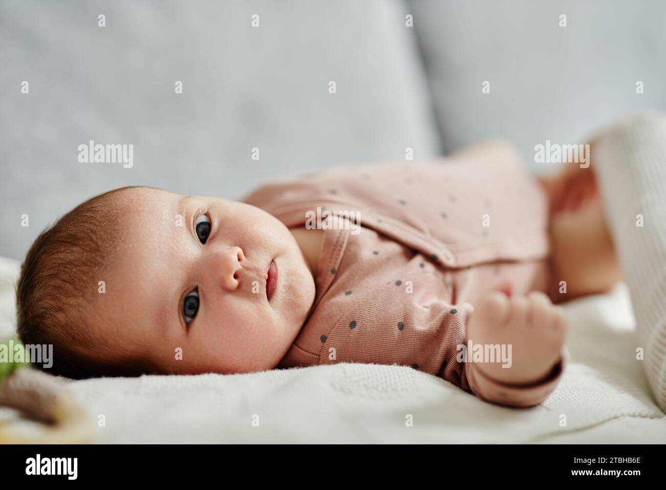 Curious Baby with Big Eyes Close Up Stock Photo