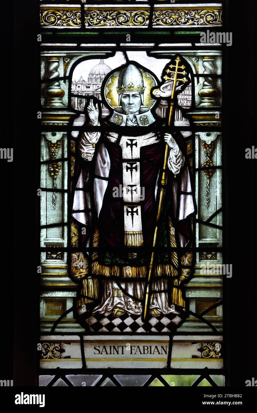 Full-length Portrait of Pope Fabian (236-250), Saint Fabian, Bishop of Rome. Stained glass Window in the Cloisters Chester Cathedral Stock Photo