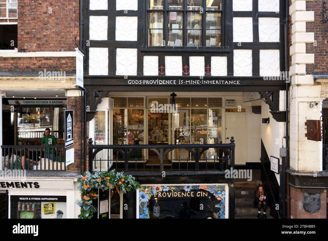 God's Providence House (1652) & Boutique Shops on The Rows Watergate Street Old Town or Historic District Chester England UK Stock Photo