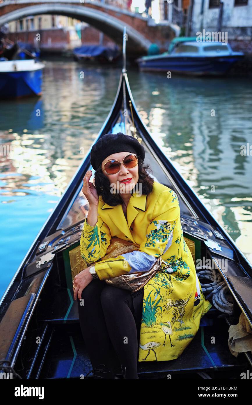 Woman in black coat beret hi-res stock photography and images - Alamy