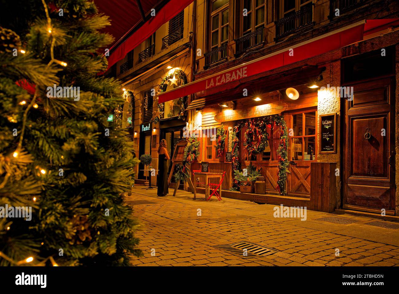 LYON, December 6, 2023 : Streets of Lyon city center by night. Lyon commemorates 25 years of inscription of old city center on World Heritage sites li Stock Photo