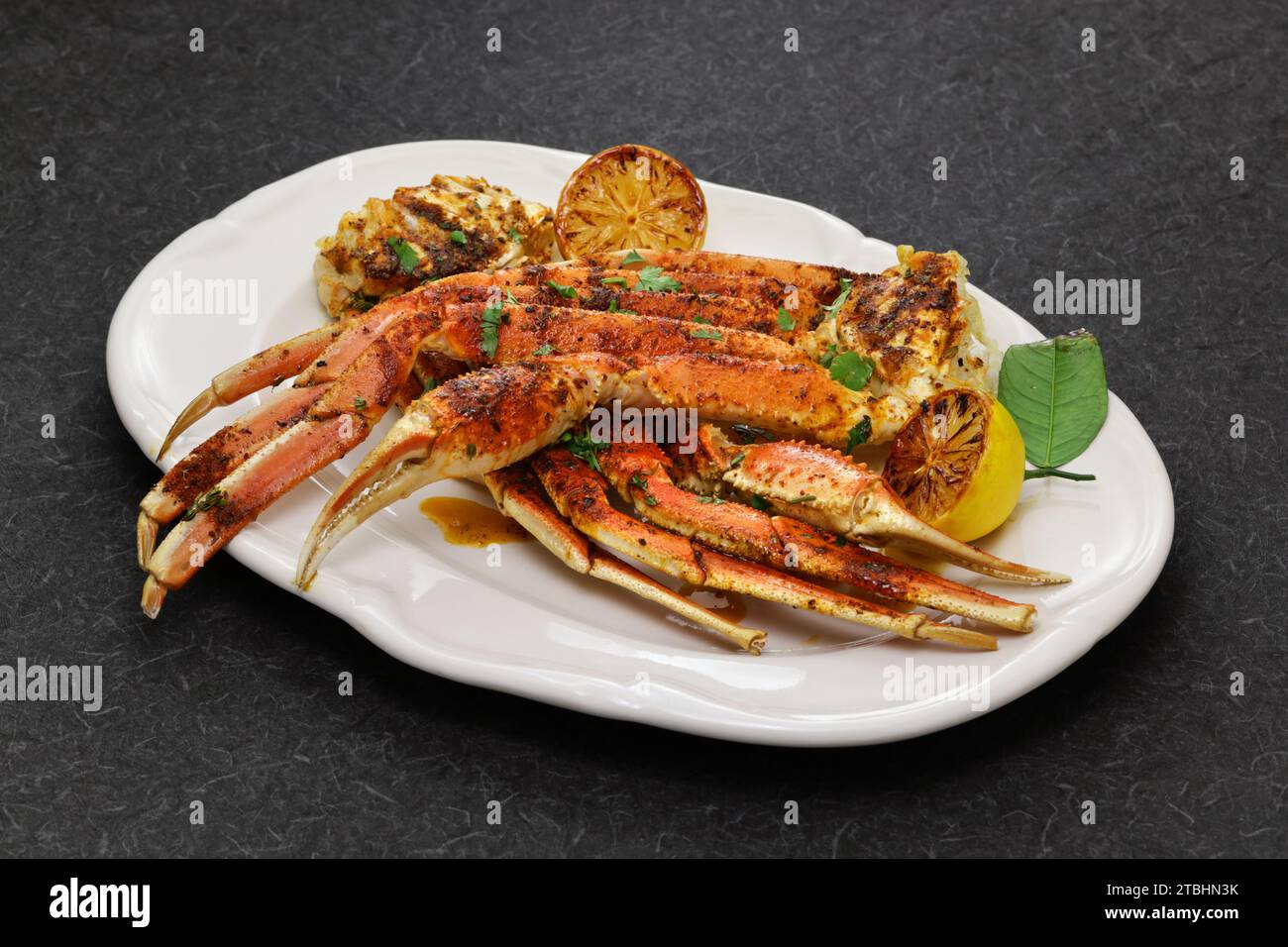 cajun style grilled snow crab legs Stock Photo Alamy