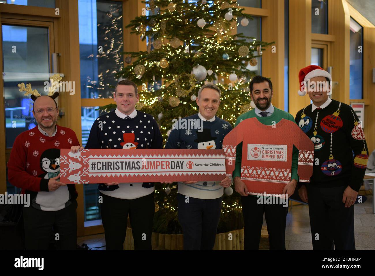 Edinburgh Scotland, UK 07 December 2023. Party leaders pose for Save the Children Christmas Jumper Day at the Scottish Parliament. credit sst/alamy live news Stock Photo