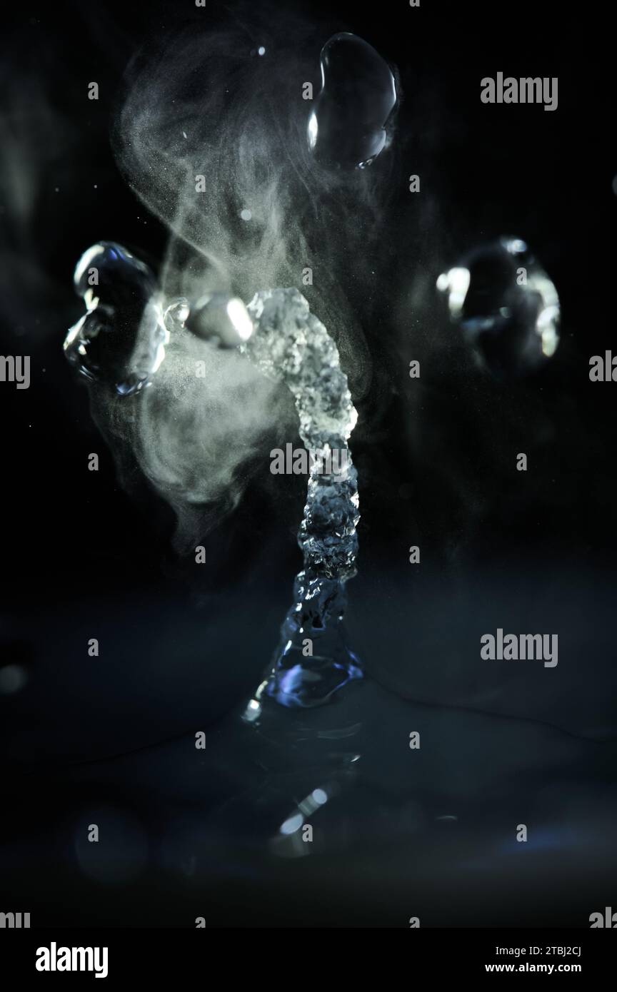 The process of boiling water, a stream of water shooting out of a ...