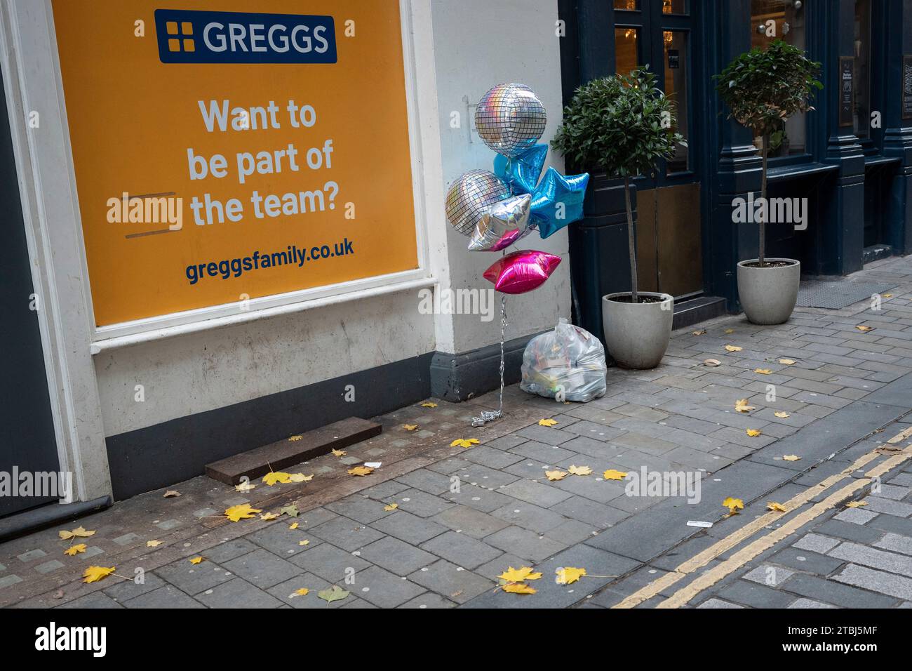 A street billboard advertises for jobs and careers with the Greggs bakery and retail company, on 7th December 2023, in the City of London, England. Stock Photo