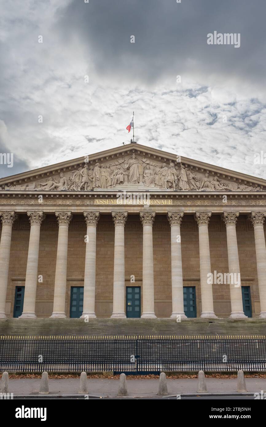 Paris, France, 2023. The façade of the Palais Bourbon which houses the Assemblée Nationale, lower chamber of the French Parliament (vertical) Stock Photo