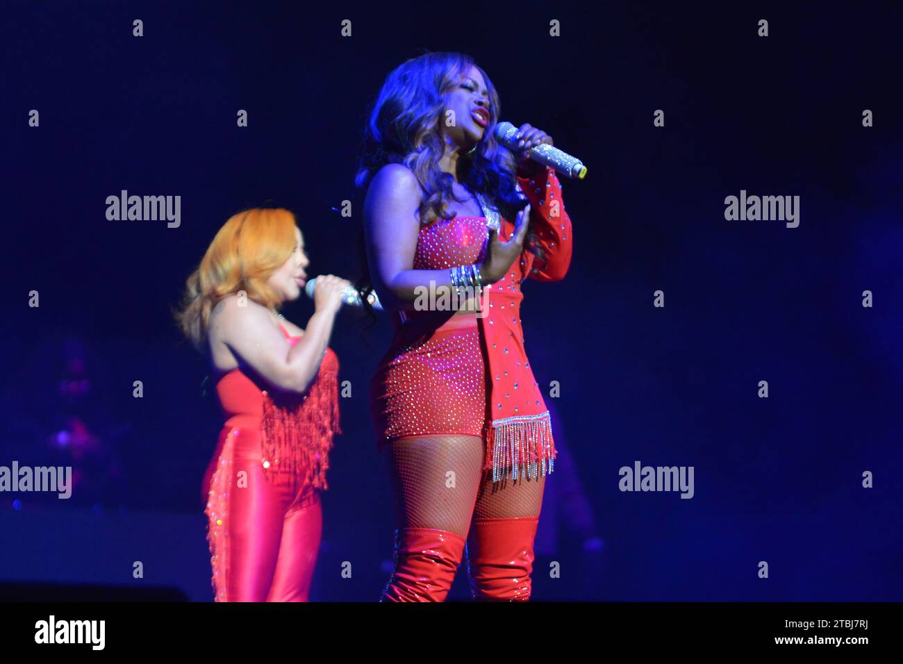 Miami, USA. 03rd Dec, 2023. MIAMI, FLORIDA - DECEMBER 03: Tiny Harris and Kandi Burruss of R&B group Xscape perform live on stage during 'Miami R&B Music Experience' concert at Kaseya Center on December 03, 2023 in Miami, Florida. (Photo by JL/Sipa USA) Credit: Sipa USA/Alamy Live News Stock Photo