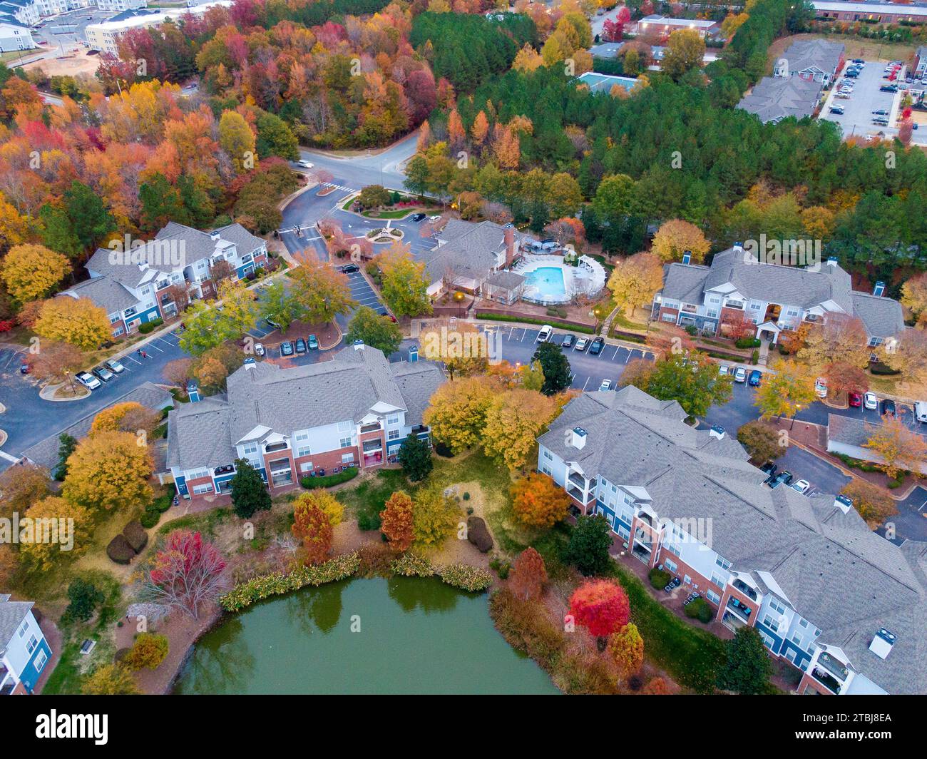 Drone photos of an apartment complex showing beautiful fall colors. Stock Photo