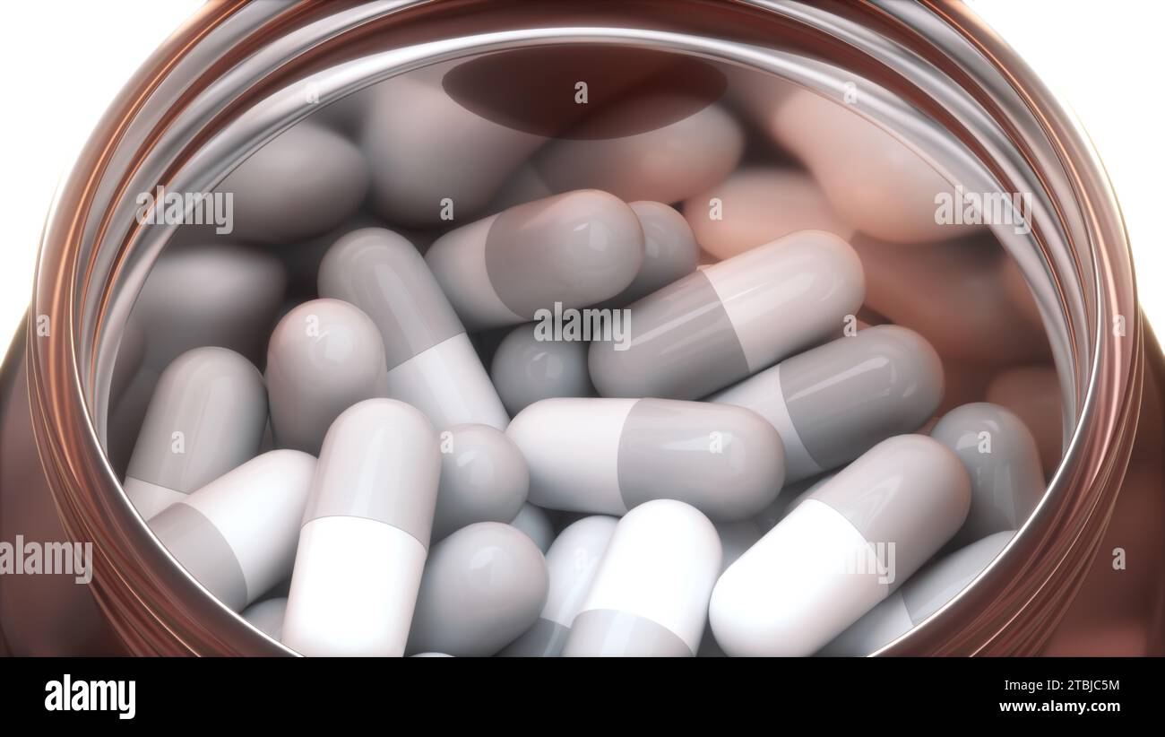 Capsule Pills Inside in a Open Transparent Brown Glass Jar on a Light