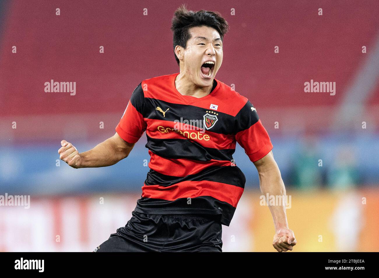 Wuhan, China. 06th Dec, 2023. Lee Ho-jae #33 of Pohang Steelers celebrates a goal during the AFC Champions league football match between Wuhan Three Towns FC of China and Pohang Steelers of South Korea at Wuhan Sports Center Stadium. Final scores; Wuhan Three Towns FC of China 1-1 Pohang Steelers of South Korea. Credit: SOPA Images Limited/Alamy Live News Stock Photo