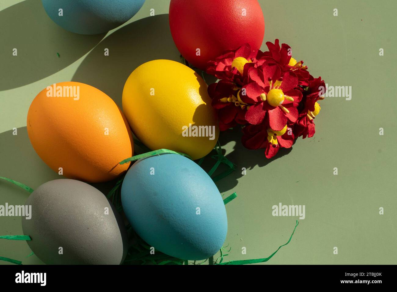 colorful eggs symbolize easter. Easter minimal concept. Creative Happy Easter, spring layout. Stock Photo