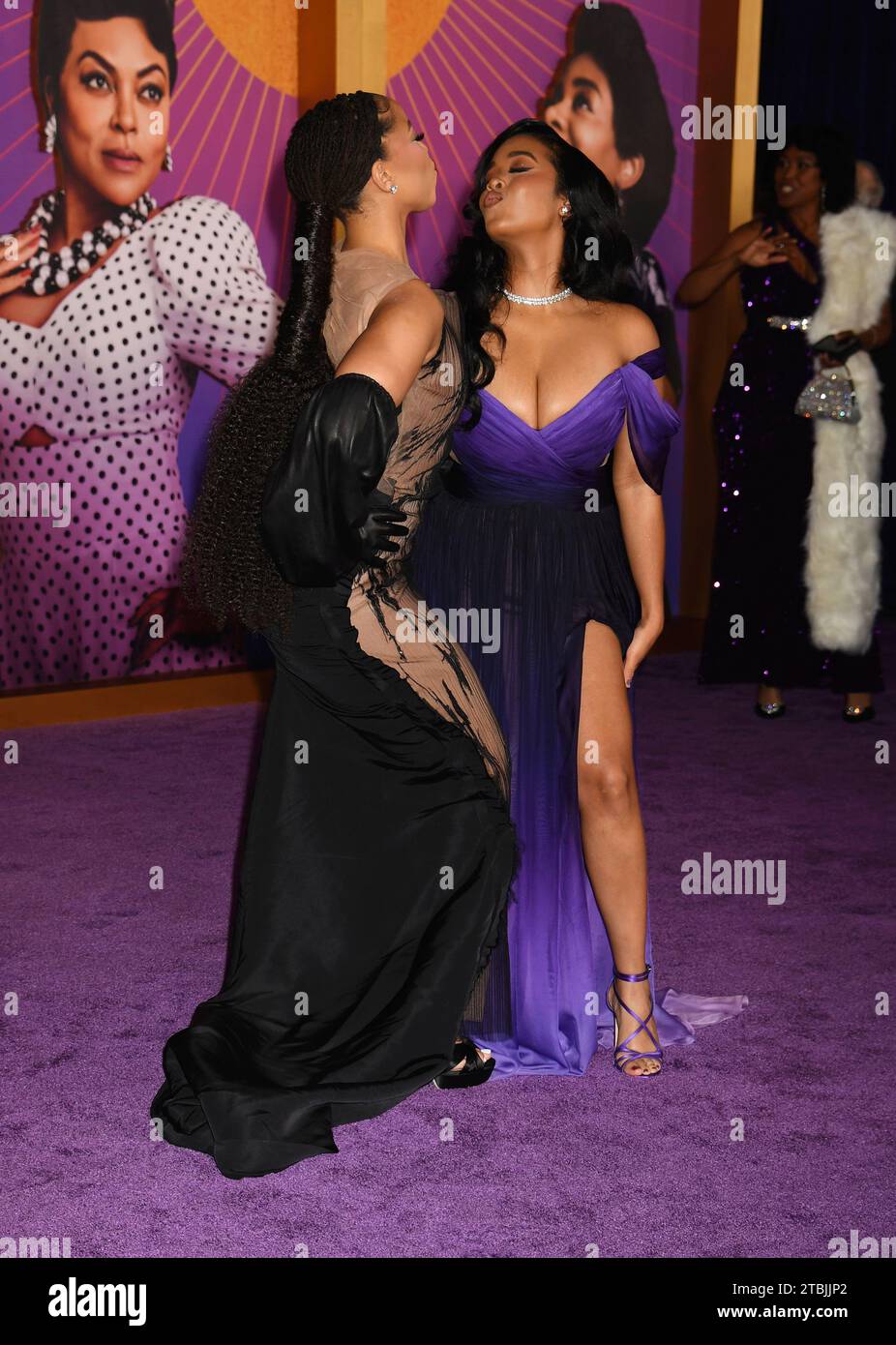 LOS ANGELES, CALIFORNIA - DECEMBER 06: (L-R) Chloe Bailey and Gabriella Wilson aka H.E.R. attend the World Premiere of Warner Bros.' 'The Color Purple Stock Photo
