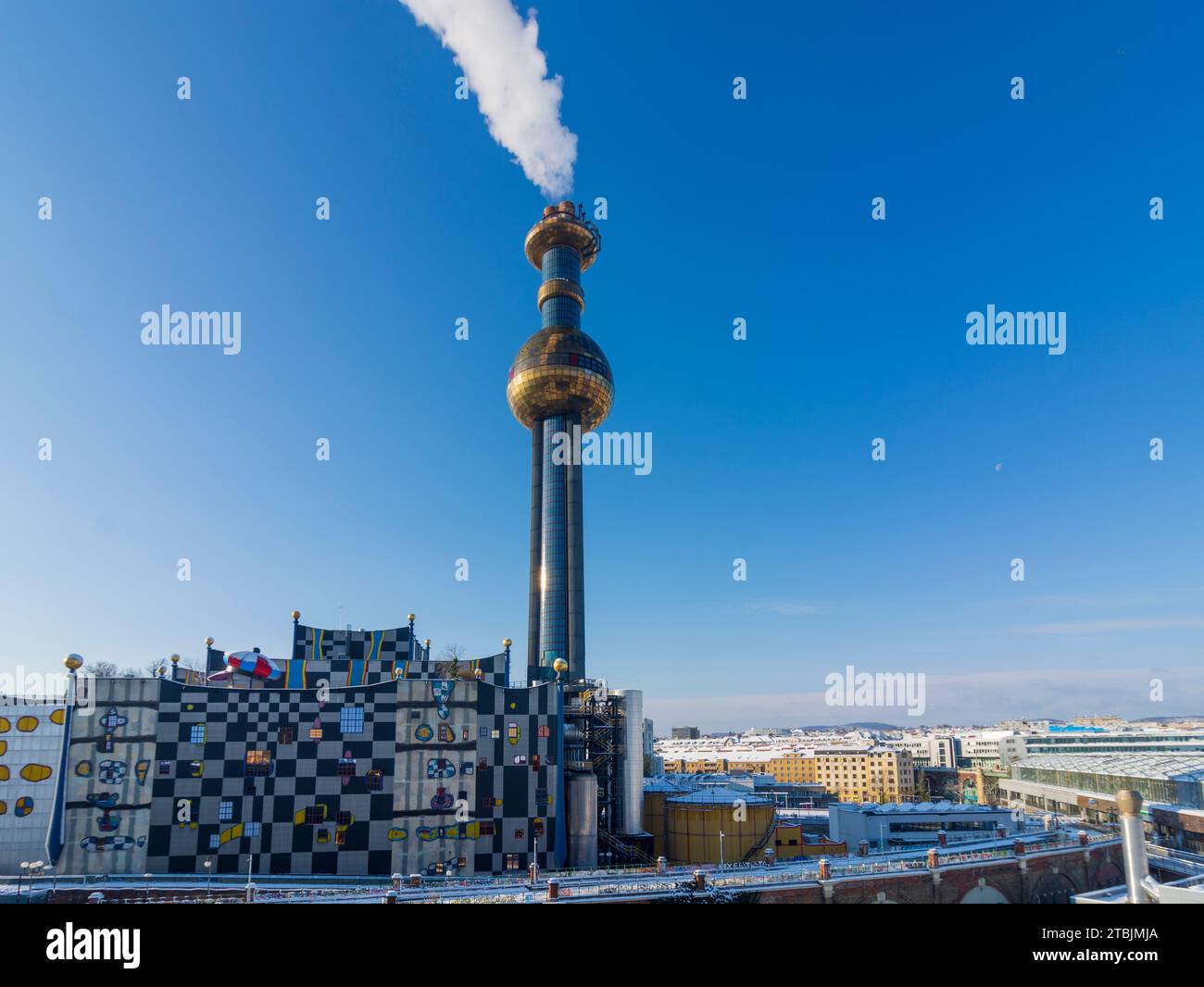 Vienna: Spittelau waste incineration plant, facade artistically designed by Friedensreich Hundertwasser, snow in 09. Alsergrund, Wien, Austria Stock Photo