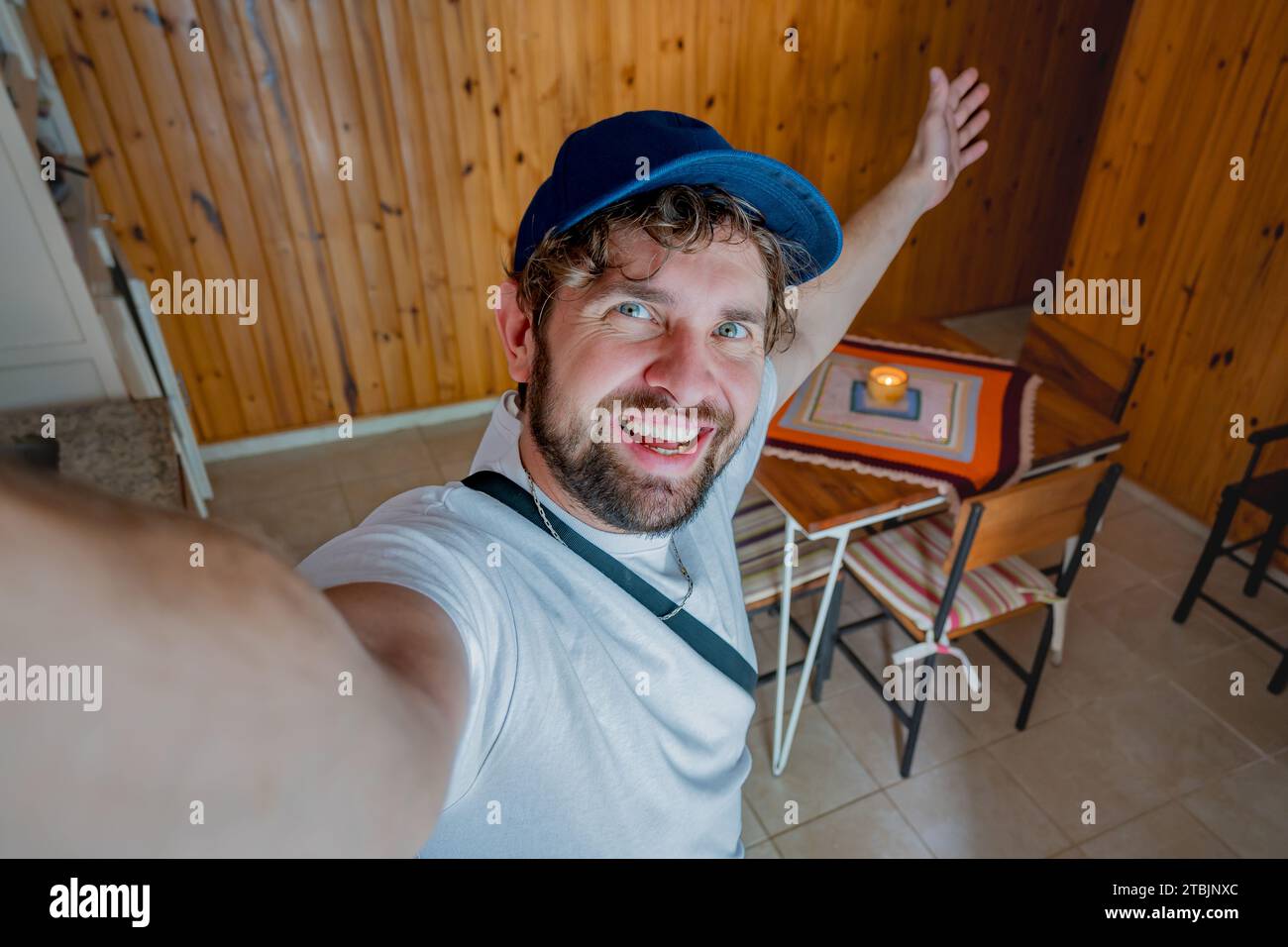 Selfie of a tourist in a Latin American temporary apartment. Stock Photo