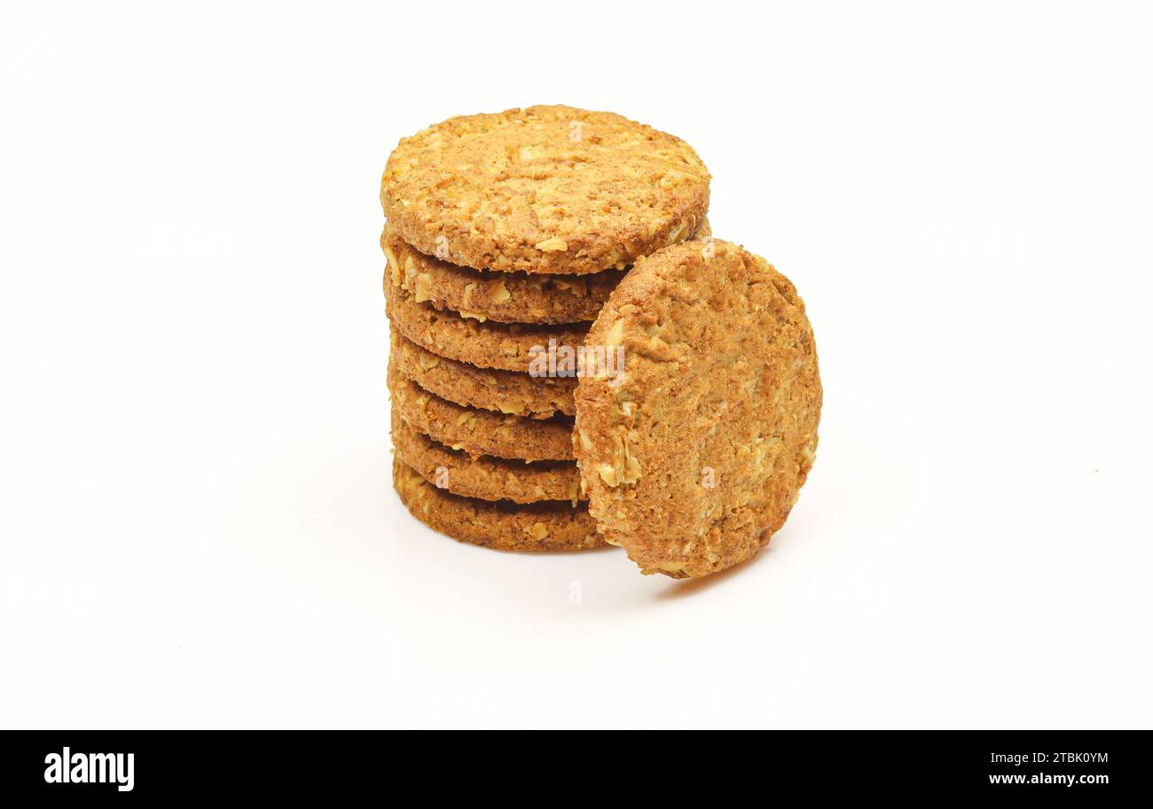 Stack o healthy integral cookies made of oats isolated on white background Stock Photo