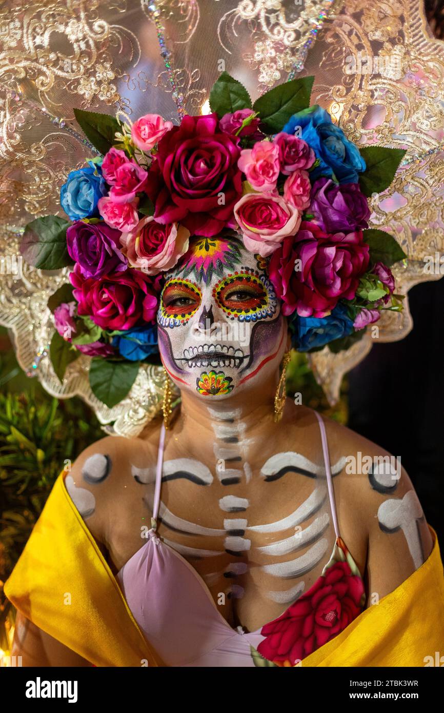 Mexico, Isla Mujures, A  woman dressed  in costume to celebrate the Day of the Dead also known as dia de los Muertos Stock Photo
