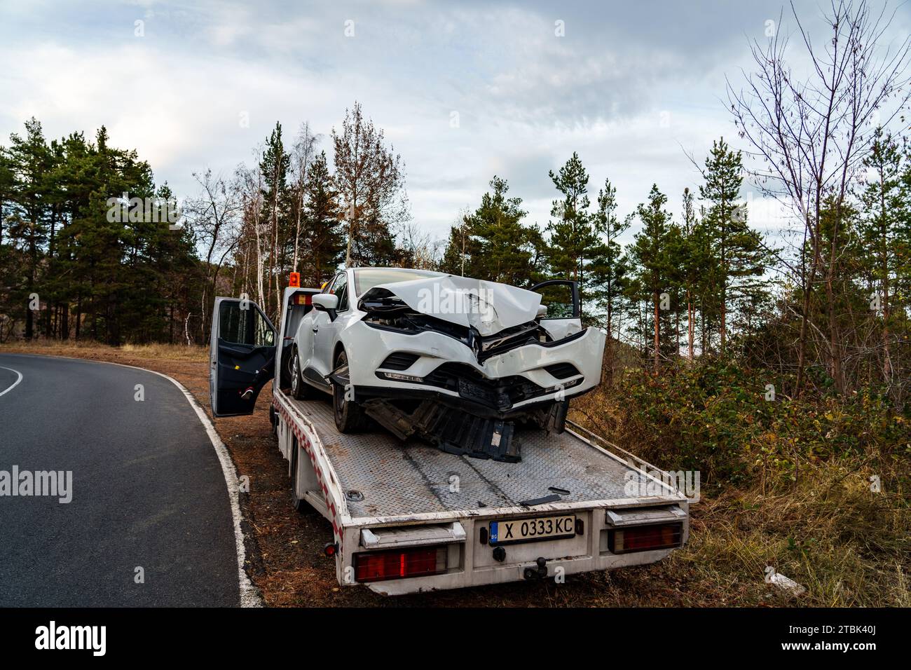 Ardino, Bulgaria - 2nd December, 2023 : Rental Vehicle crashed to tree on country road in Between Ardino and Karzdhali, Rodophi Mountains and Car was Stock Photo
