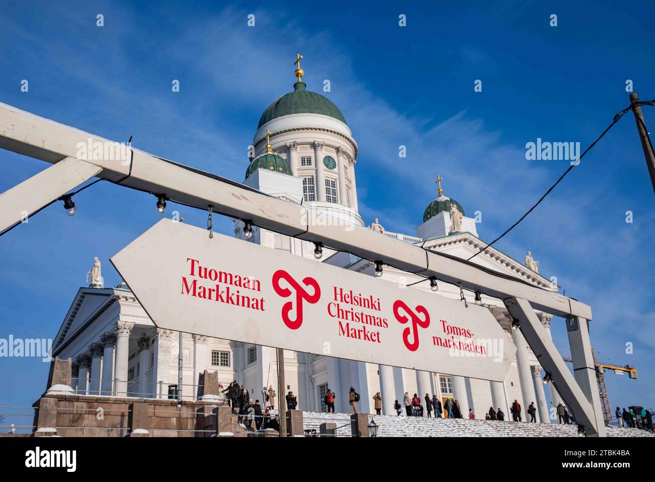 Tuomaan Markkinat or Helsinki Christmas Market sign against Helsinki Cathedral on a sunny December day in Helsinki, Finland Stock Photo