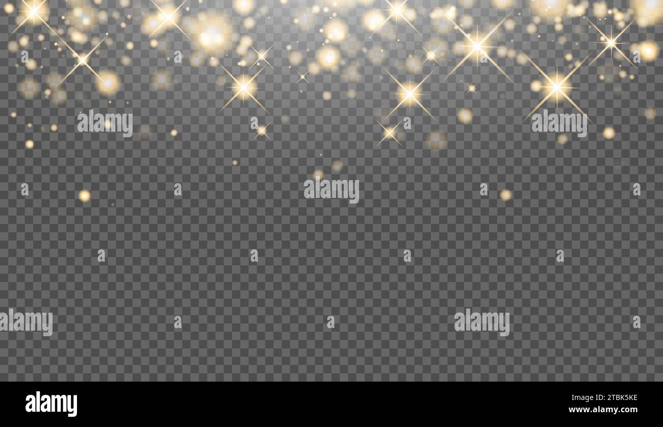 Glowing gold sparkles. The glitter of golden dust in the rays of light