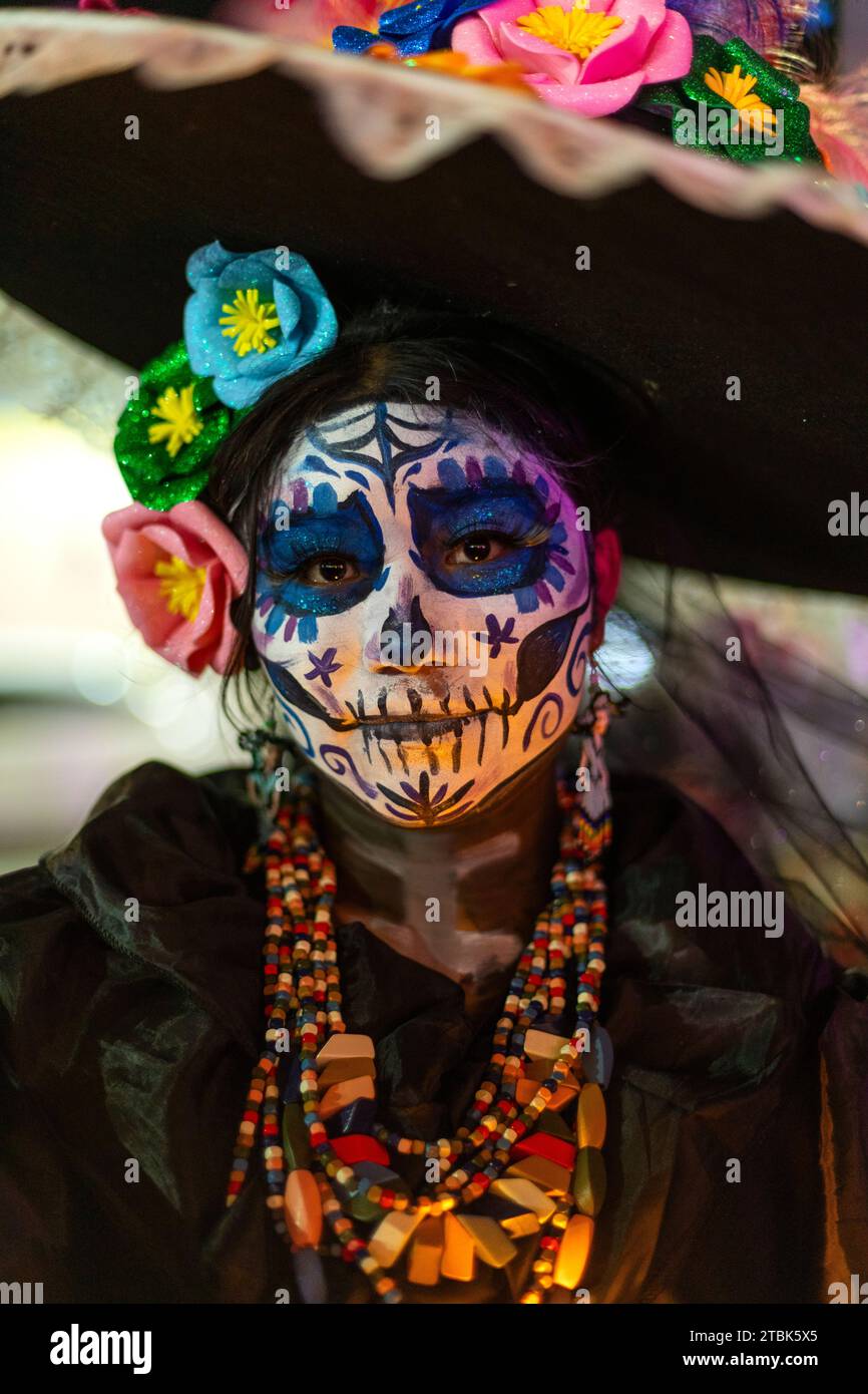 Mexico, Isla Mujures, A  woman dressed  in costume to celebrate the Day of the Dead also known as dia de los Muertos Stock Photo