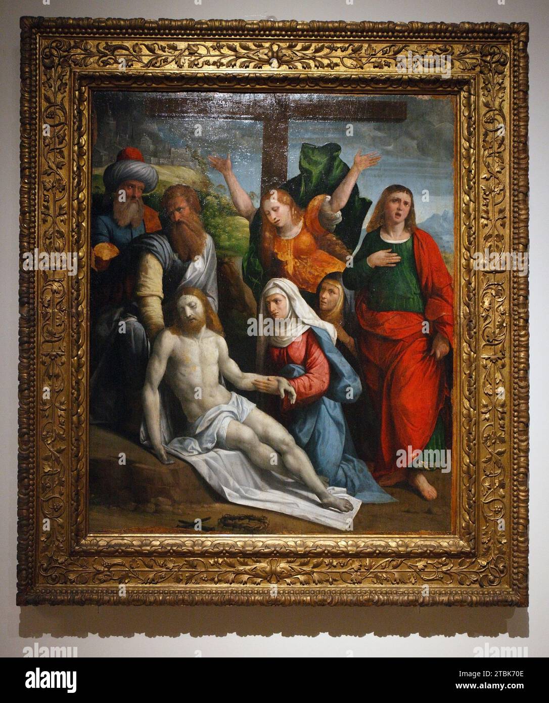 Italy Modena Galleria Estense -  The Pieta with the Virgin, Saint John, Magdalene, Nicodemus and two other figures. Garofalo's workshop 1527 Stock Photo