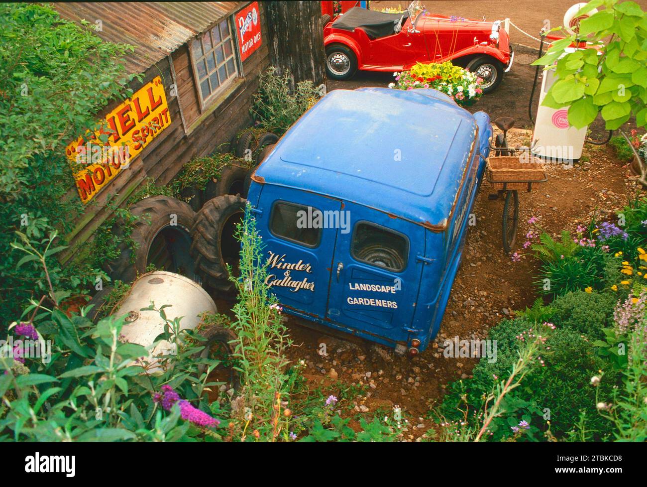 Old garage with MG car Stock Photo - Alamy