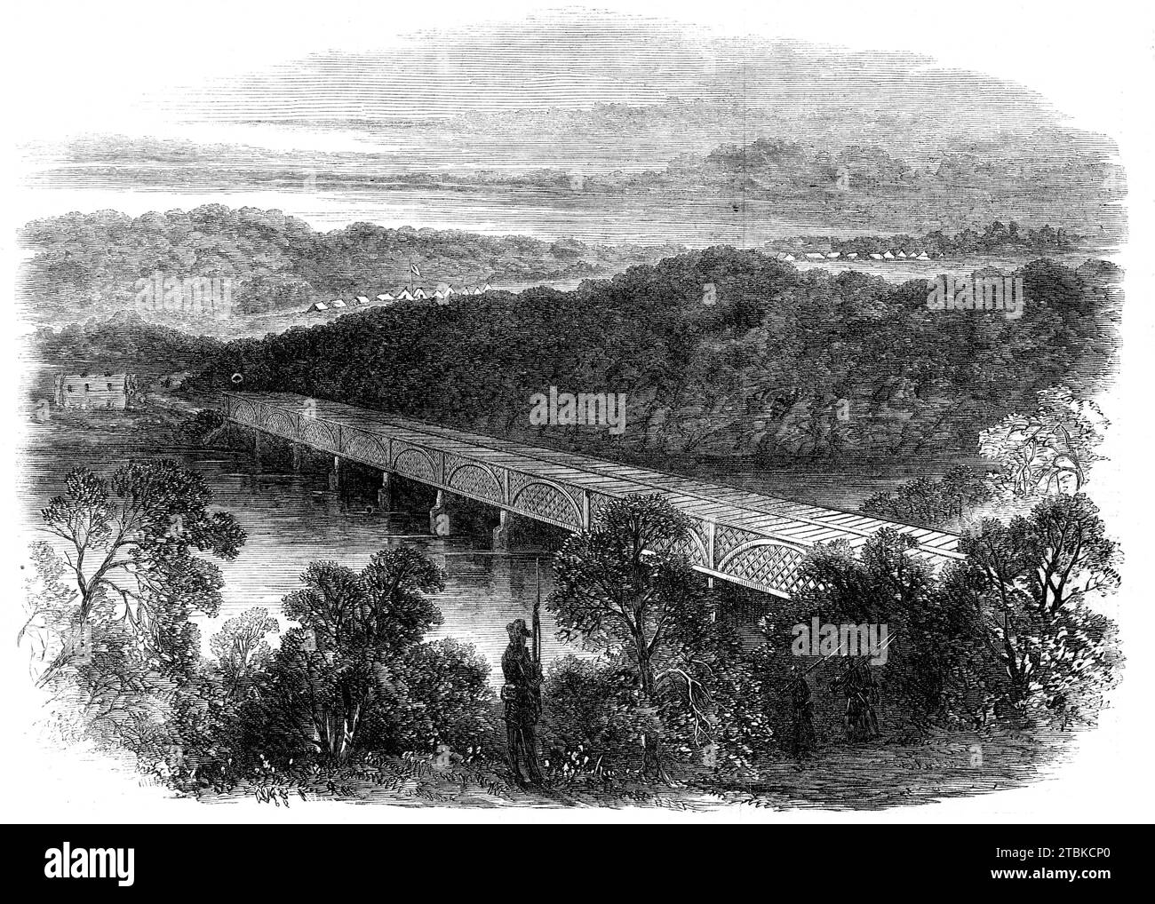 The War in America: the Chain-Bridge across the Potomac above Georgetown, looking towards the Virginian shore - from a sketch by our special artist, 1861. 'The two great armies still stand at bay on the lines of the Potomac, and the chain-bridge across that river, above Georgetown...is a position of great interest just now, as the Confederates are continually making threatening movements in the neighbourhood, either with the intention of destroying the bridge or of crossing by it into Maryland. On the heights on the Virginian shore are seen the tents of the Federal advance, which throws out pi Stock Photo