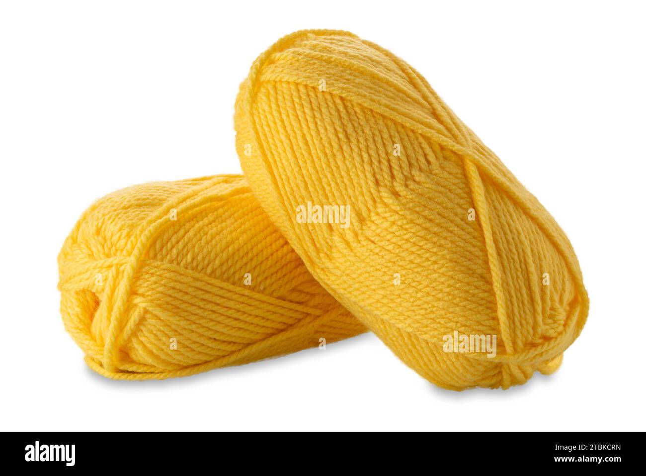 Balls of yellow-colored wool yarn isolated on white with clipping path included Stock Photo