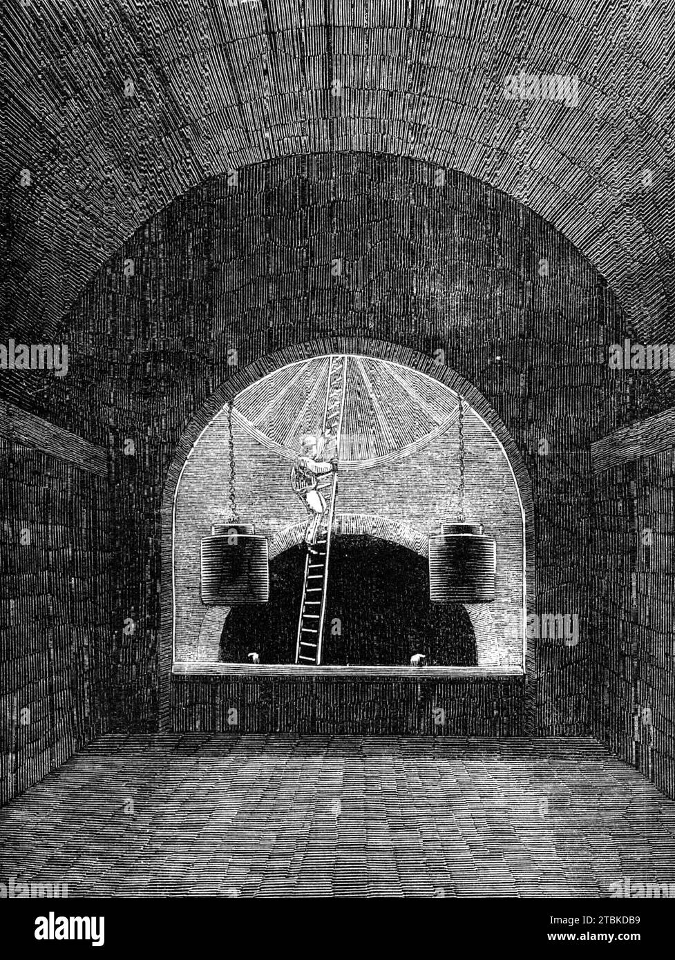 London Main Drainage: the Penstock Chamber at Old Ford, 1861. 'At Old Ford, the northern high-level, the middle-level, and the Hackney-brook sewers meet in what is called the penstock chamber. A penstock is simply a gate to regulate the passage of water through an aperture...the name of penstock has been given to the very large gates which will regulate the ebb of the drainage waters coming down from a large part of the northern district of London...The waters, having arrived in it from the high and middle level sewers, will pass through the large arched passage in the foreground of the Sketch Stock Photo