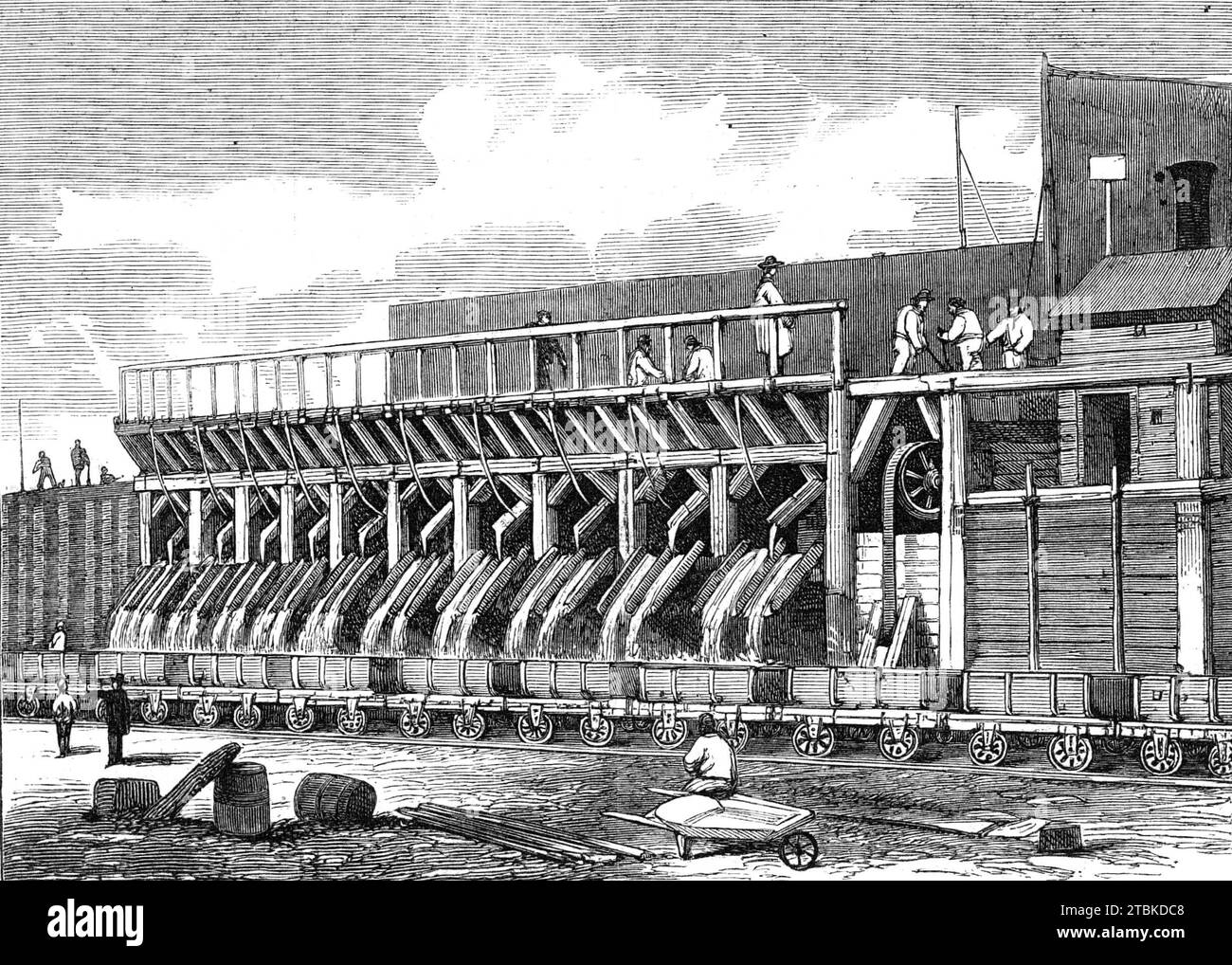 London Main Drainage: the Concrete Mills at Plaistow, 1861. During the early 19th century the River Thames was an open sewer, with disastrous consequences for public health in London, including cholera epidemics. Proposals to modernise the sewerage system had been made in the early 1700s but the costs of such a project deterred progress. However, after the Great Stink of 1858, Parliament realised the urgency of the problem and resolved to create a modern sewerage system. View of concrete manufactory making Portland cement for tunnel-building. Railway wagons carry the cement to the various cons Stock Photo