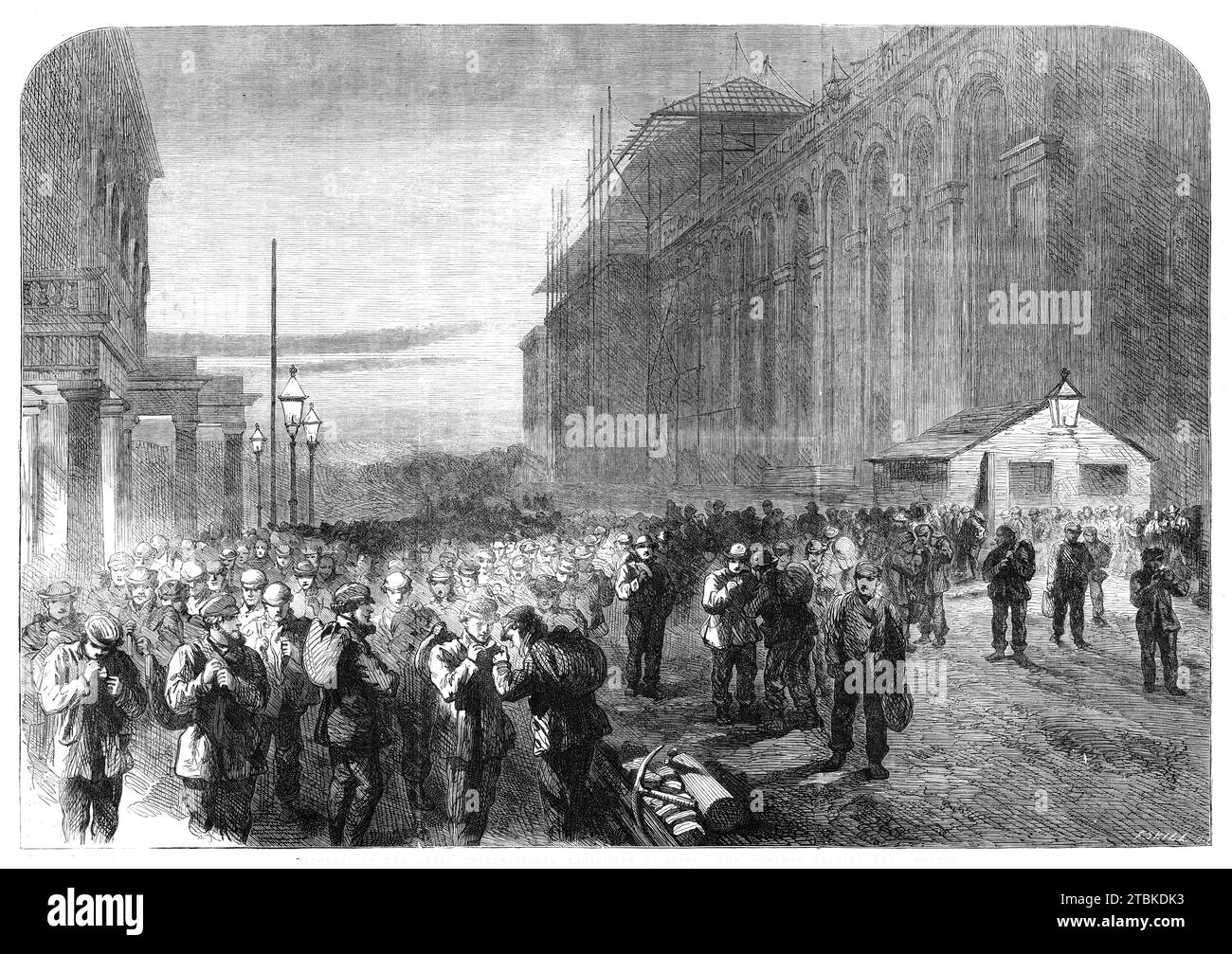 Progress of the Great International Exhibition building: the workmen leaving the grounds, [South Kensington, London], 1861. Our engraving represents a picturesque scene enough, which takes place in the closing gloom every evening - the workmen employed upon the building (in round numbers, some thousand) leaving the building and proceeding to their homes. Such a mass of human industry and intelligence was perhaps never before seen issuing from one field of labour of similar dimensions. The men employed upon this great work, we understand, are all picked men of their several classes; and, from a Stock Photo