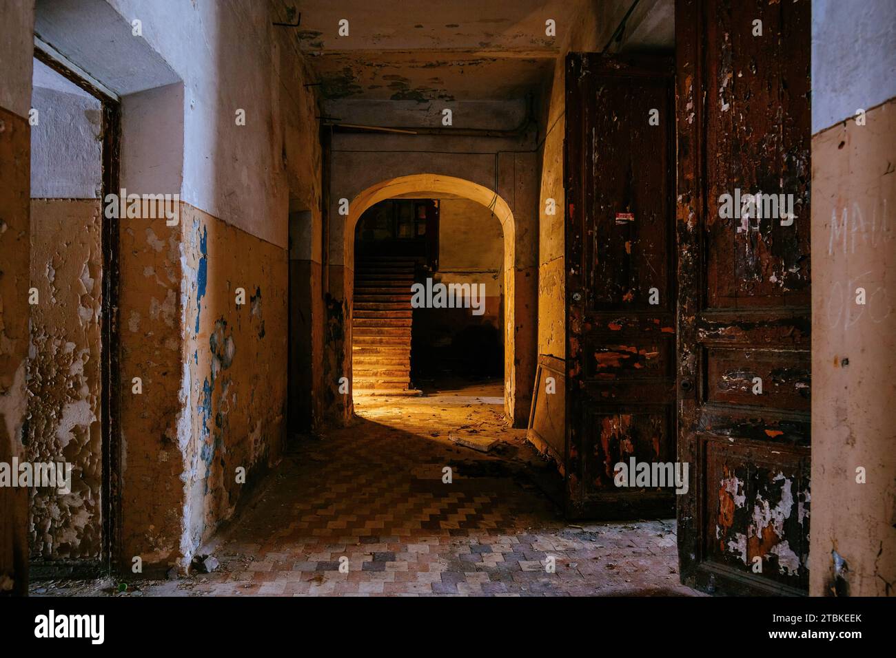Dark vaulted corridor in old abandoned building. Stock Photo