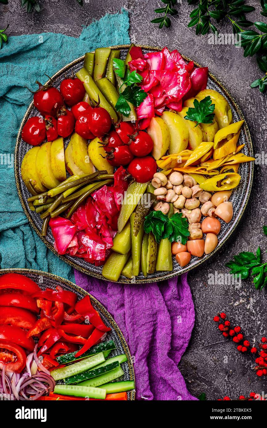 Assorted pickled vegetables on a large platter top veiw.selective focus Stock Photo