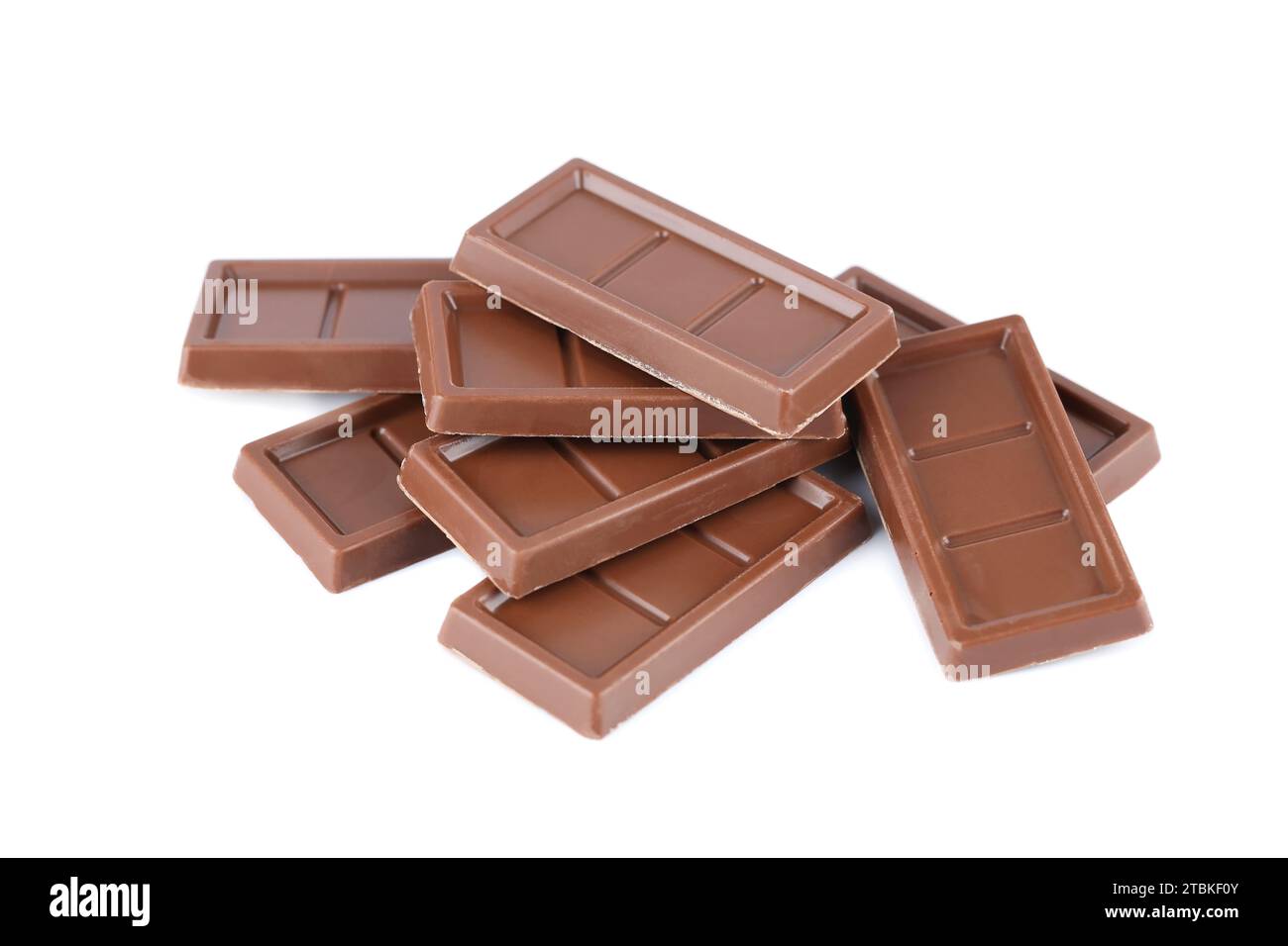 Heap of chocolate bars isolated on white background. Stock Photo