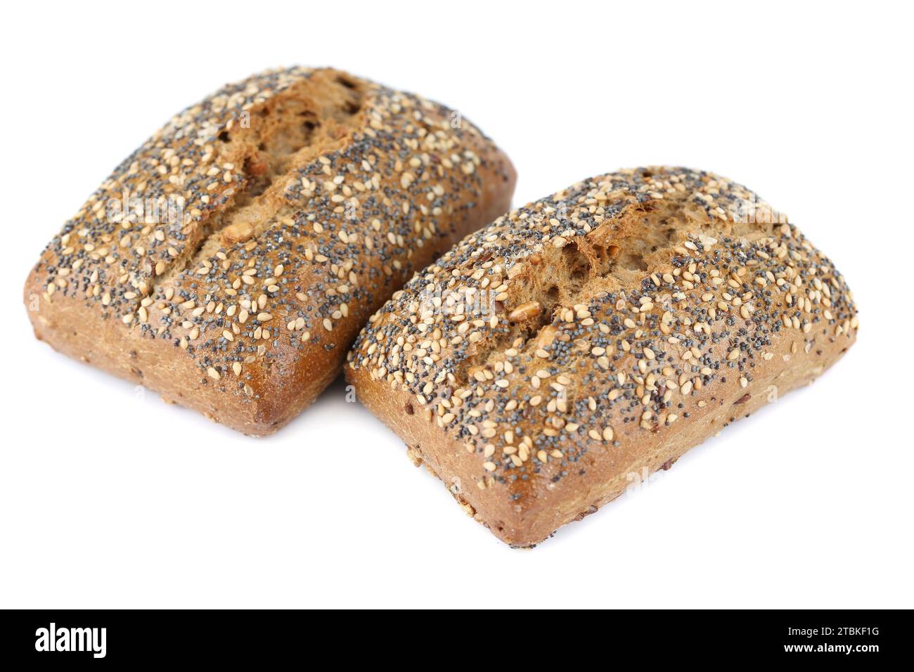 Two organic bread with poppy and sesame seeds isolated on white ...