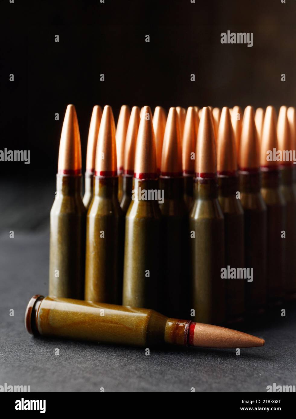 Ammunition, bullets, live ammunition for firearms on a dark background