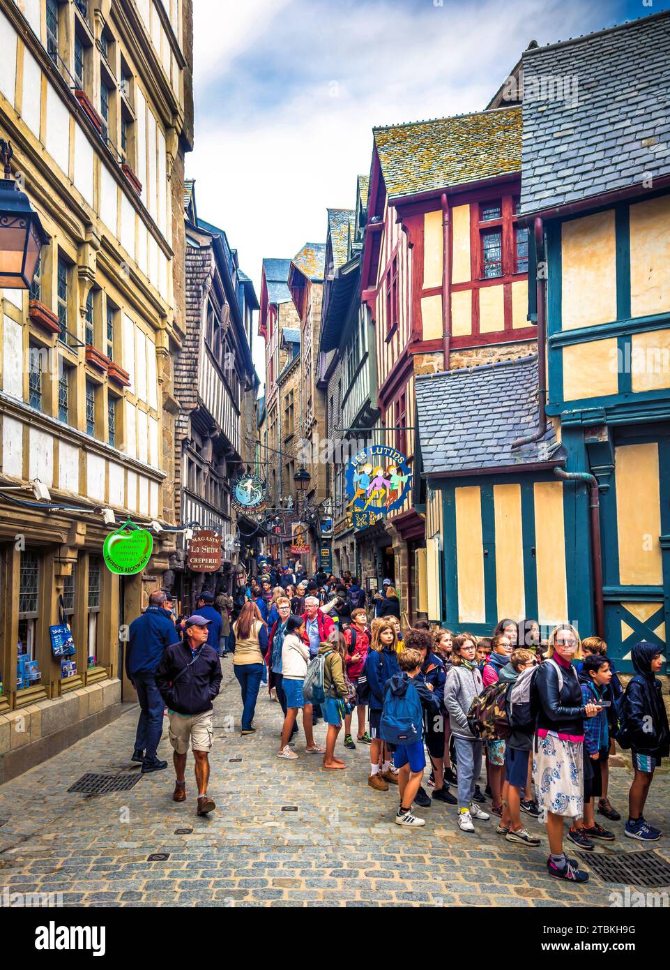 Normandy, France, Sept 22nd 2023, view of some kids on a school trip in a street of the Mont Saint-Michel Stock Photo