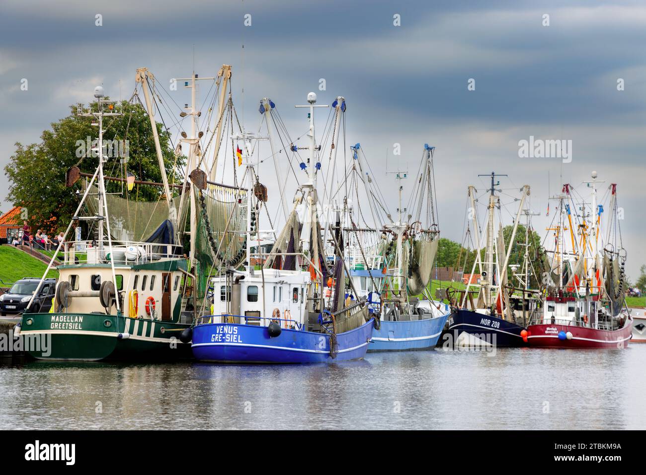 Shrimp cutters in the harbour in Greetsiel, East Frisia, Germany. Stock Photo